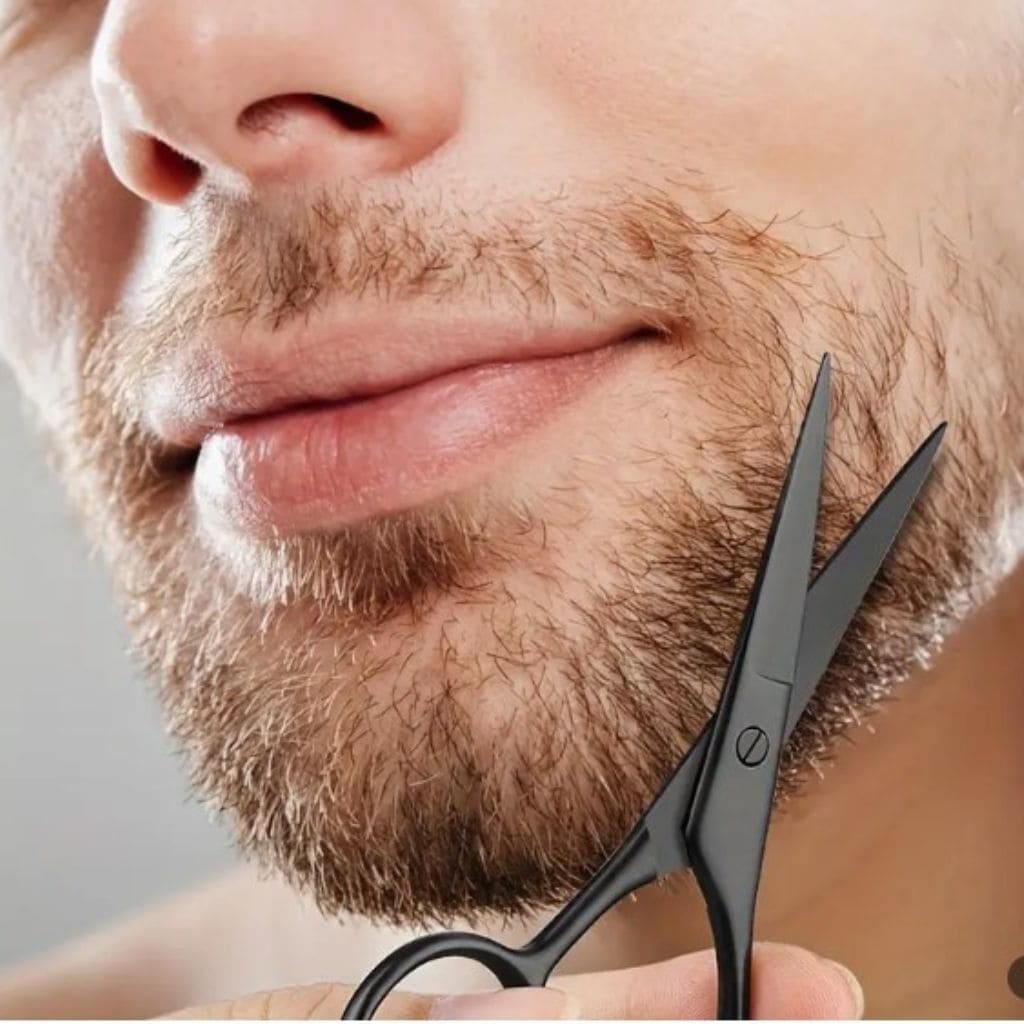 un modèle tiens ciseaux à barbe
